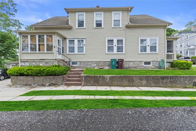 20 Cold Spring Pl, Woonsocket, RI 02895 - view of front of home with a sunroom and a shingled roof