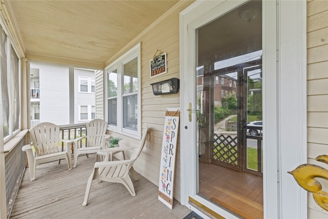 20 Cold Spring Pl, Woonsocket, RI 02895 - sunroom / solarium with wooden walls, wood finished floors, and wooden ceiling