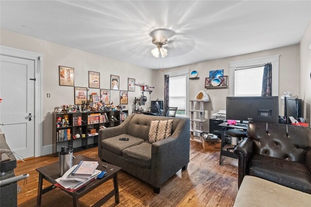 20 Cold Spring Pl, Woonsocket, RI 02895 - living area with a desk, wood finished floors, and ceiling fan