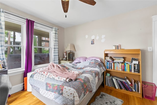 20 Cold Spring Pl, Woonsocket, RI 02895 - bedroom featuring wood finished floors, a ceiling fan, and baseboards