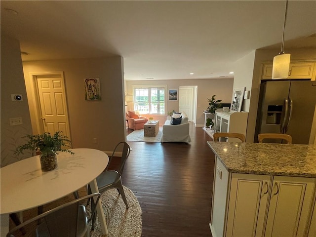 60 Saw Mill Dr Unit 303, North Kingstown, RI 02852 - kitchen with stainless steel fridge with ice dispenser, dark wood-style flooring, open floor plan, decorative light fixtures, and light stone counters