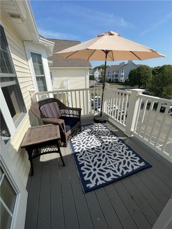 60 Saw Mill Dr Unit 303, North Kingstown, RI 02852 - view of wooden deck