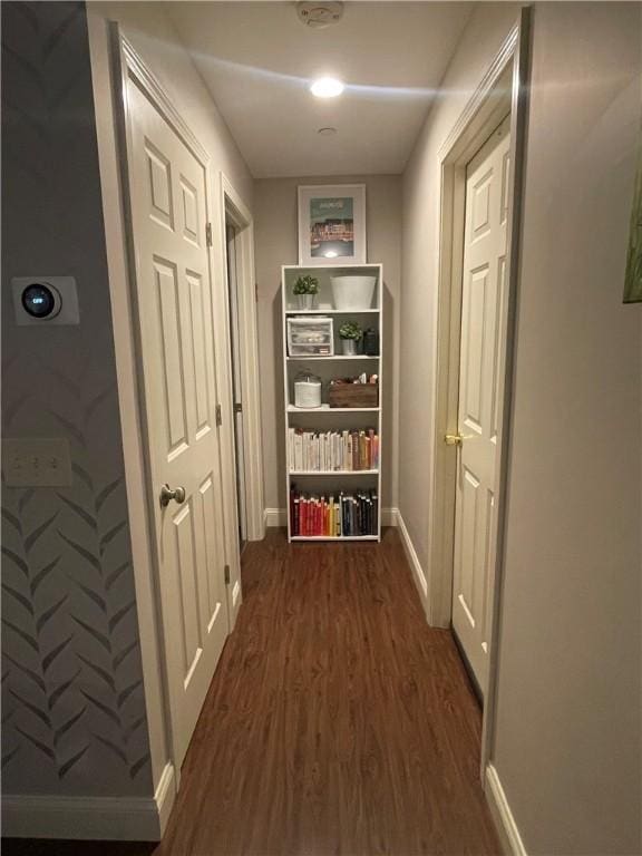 60 Saw Mill Dr Unit 303, North Kingstown, RI 02852 - hall with dark wood-style flooring and baseboards