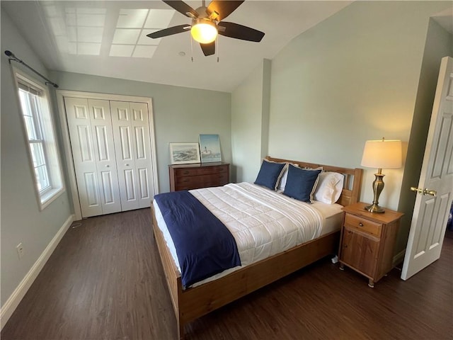 60 Saw Mill Dr Unit 303, North Kingstown, RI 02852 - bedroom featuring wood finished floors, vaulted ceiling, baseboards, a closet, and a ceiling fan