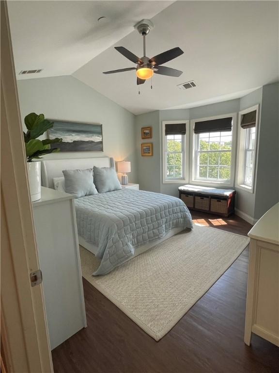 60 Saw Mill Dr Unit 303, North Kingstown, RI 02852 - bedroom featuring vaulted ceiling, dark wood finished floors, ceiling fan, and baseboards