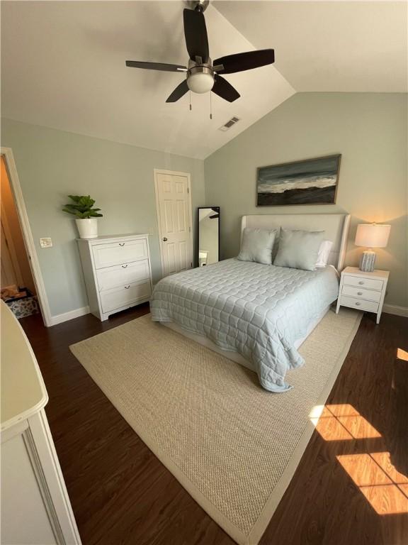 60 Saw Mill Dr Unit 303, North Kingstown, RI 02852 - bedroom featuring lofted ceiling, baseboards, wood finished floors, and a ceiling fan