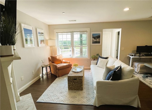 60 Saw Mill Dr Unit 303, North Kingstown, RI 02852 - living room with wood finished floors, baseboards, and recessed lighting