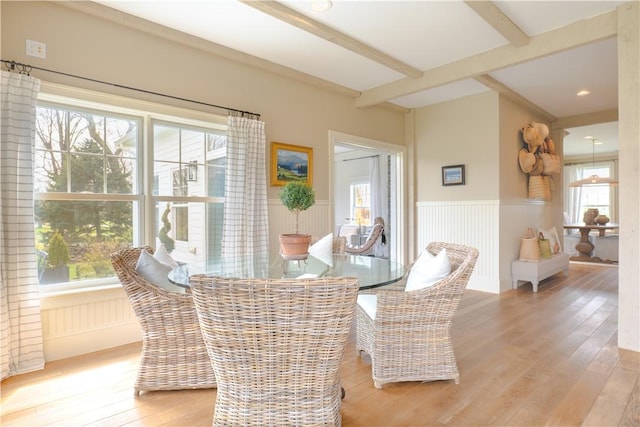 62 James Ct, Portsmouth, RI 02871 - dining space featuring light wood finished floors, healthy amount of natural light, a wainscoted wall, beamed ceiling, and recessed lighting