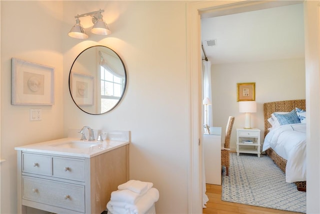 62 James Ct, Portsmouth, RI 02871 - bathroom with vanity and wood finished floors