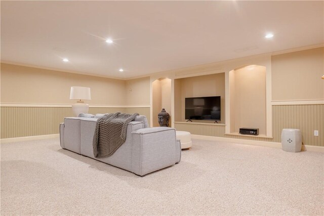 62 James Ct, Portsmouth, RI 02871 - carpeted living room with arched walkways, ornamental molding, wainscoting, and recessed lighting
