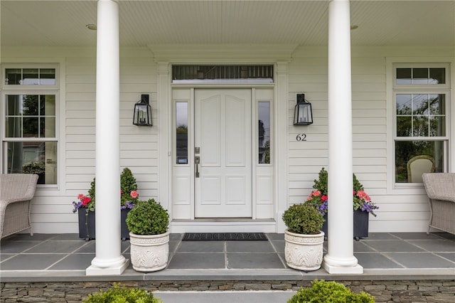 62 James Ct, Portsmouth, RI 02871 - view of exterior entry with a porch