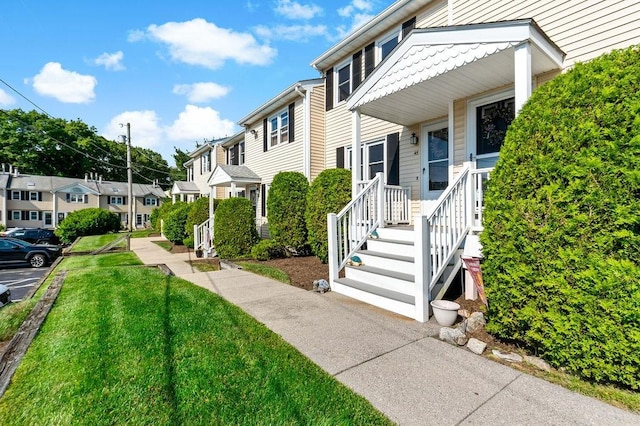47 Morgan Ave Unit 45, Johnston, RI 02919 - doorway to property with a residential view and a lawn
