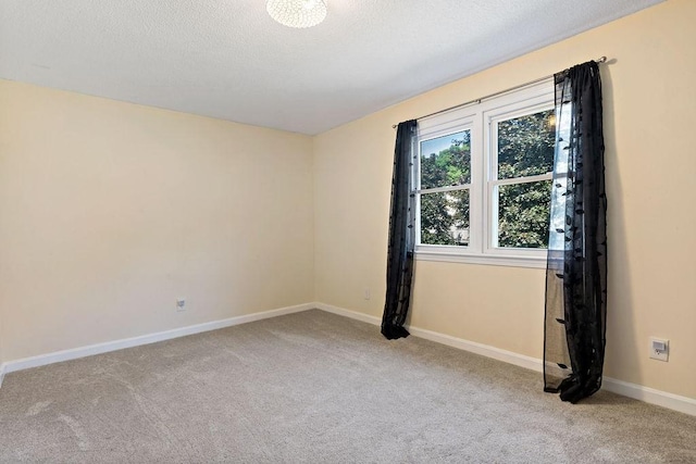 47 Morgan Ave Unit 45, Johnston, RI 02919 - carpeted spare room featuring baseboards and a textured ceiling
