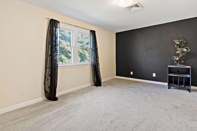 47 Morgan Ave Unit 45, Johnston, RI 02919 - carpeted spare room featuring baseboards and a textured ceiling