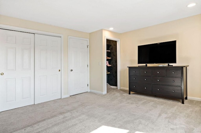 47 Morgan Ave Unit 45, Johnston, RI 02919 - unfurnished bedroom featuring light carpet, baseboards, recessed lighting, and a closet