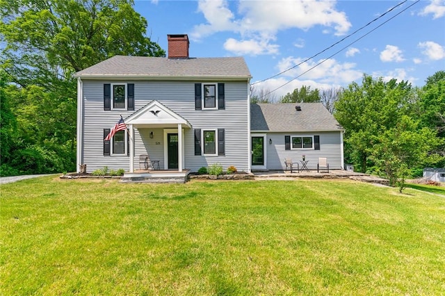 529 Rocky Hill Rd, Scituate, RI 02857 - view of front of property with a chimney, a front lawn, and a shingled roof