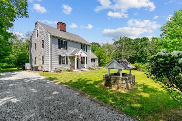 529 Rocky Hill Rd, Scituate, RI 02857 - colonial home featuring a gazebo, a chimney, cooling unit, and a front lawn
