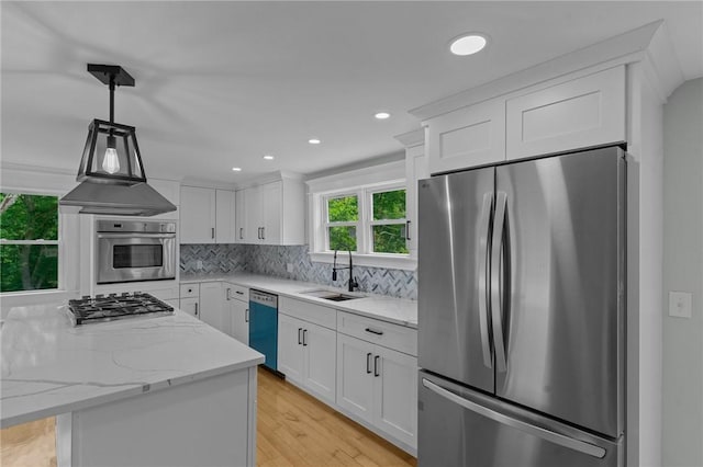 529 Rocky Hill Rd, Scituate, RI 02857 - kitchen with appliances with stainless steel finishes, a sink, white cabinetry, light wood-style flooring, and recessed lighting