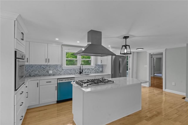 529 Rocky Hill Rd, Scituate, RI 02857 - kitchen featuring appliances with stainless steel finishes, island exhaust hood, a sink, light wood finished floors, and recessed lighting