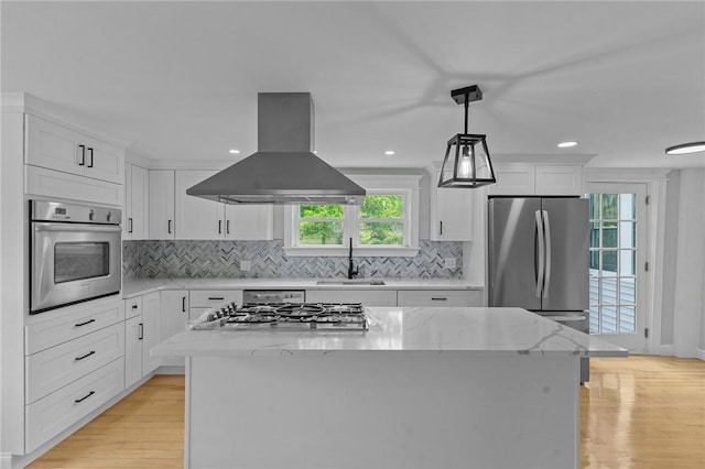 529 Rocky Hill Rd, Scituate, RI 02857 - kitchen featuring stainless steel appliances, island exhaust hood, a sink, white cabinetry, and recessed lighting
