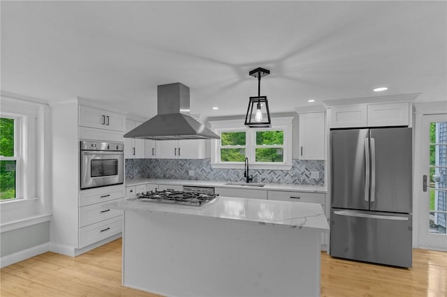 529 Rocky Hill Rd, Scituate, RI 02857 - kitchen featuring stainless steel appliances, island exhaust hood, plenty of natural light, a sink, and recessed lighting