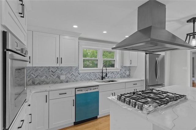 529 Rocky Hill Rd, Scituate, RI 02857 - kitchen featuring appliances with stainless steel finishes, island exhaust hood, a sink, white cabinets, and recessed lighting