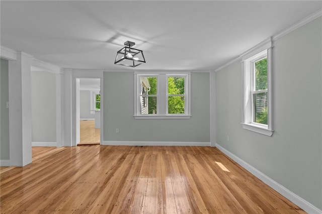 529 Rocky Hill Rd, Scituate, RI 02857 - spare room featuring light wood-style floors, baseboards, and crown molding