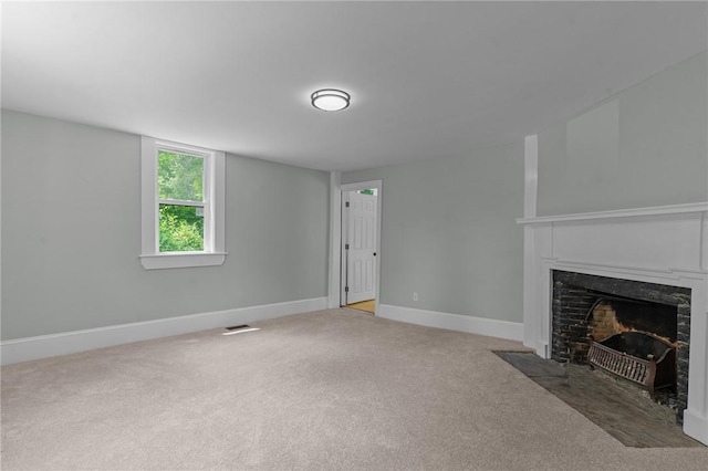 529 Rocky Hill Rd, Scituate, RI 02857 - unfurnished living room with a fireplace with flush hearth, light colored carpet, and baseboards