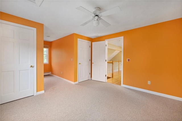 30 Walden Way S, Kingstown, RI 02879 - unfurnished bedroom featuring carpet flooring, baseboards, a baseboard radiator, and ceiling fan