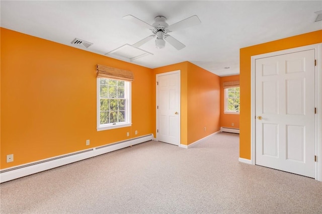 30 Walden Way S, Kingstown, RI 02879 - unfurnished bedroom featuring a baseboard radiator, carpet, baseboards, and multiple windows