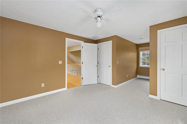 30 Walden Way S, Kingstown, RI 02879 - unfurnished bedroom with a baseboard radiator, baseboards, light colored carpet, and ceiling fan