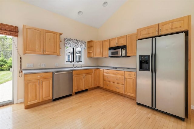 30 Walden Way S, Kingstown, RI 02879 - kitchen featuring stainless steel appliances, light brown cabinetry, light wood-style floors, and high vaulted ceiling