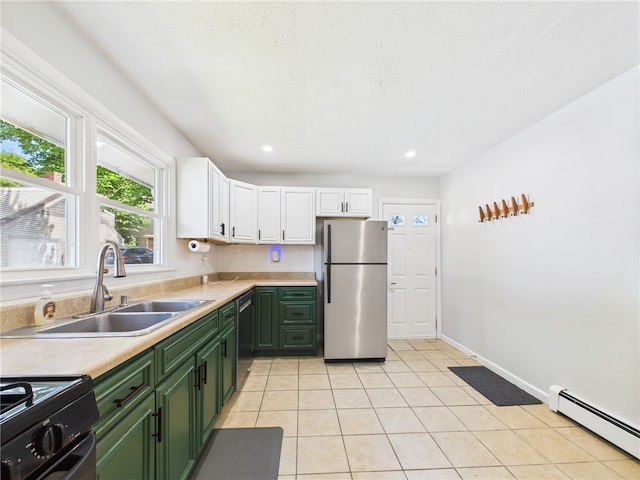 5 Conca St, North Providence, RI 02904 - kitchen with freestanding refrigerator, green cabinetry, baseboard heating, a sink, and white cabinets