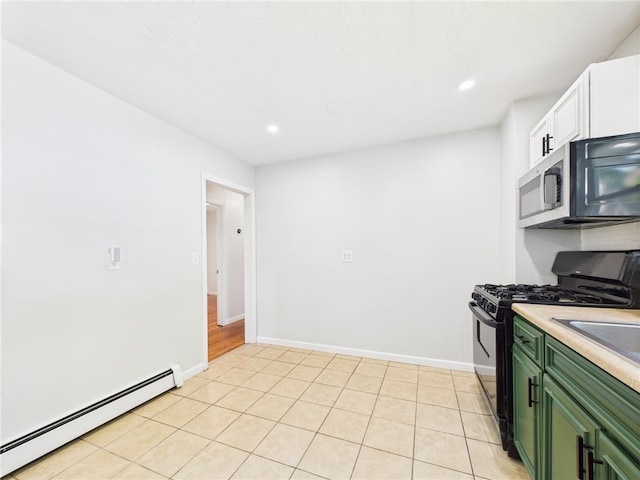 5 Conca St, North Providence, RI 02904 - kitchen with green cabinetry, black gas range, baseboard heating, stainless steel microwave, and recessed lighting