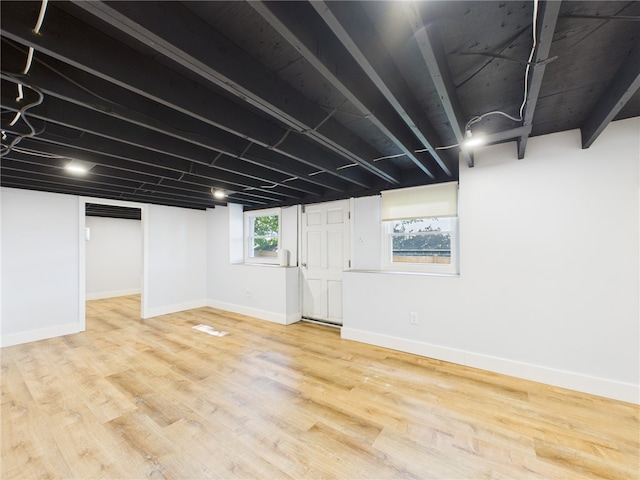 5 Conca St, North Providence, RI 02904 - below grade area featuring light wood-style floors and baseboards