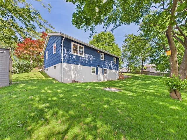 5 Conca St, North Providence, RI 02904 - rear view of house with a yard