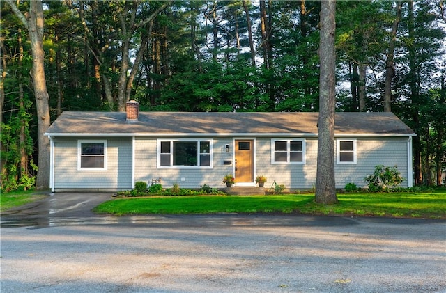 24 W Knollwood Cir, North Kingstown, RI 02852 - single story home with a chimney and a front lawn