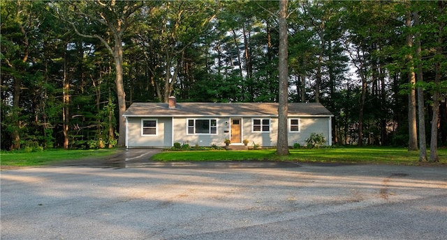 24 W Knollwood Cir, North Kingstown, RI 02852 - ranch-style house with a front lawn and a chimney