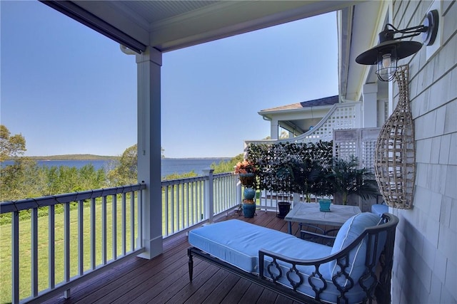 171 Leeshore Ln, Tiverton, RI 02878 - wooden deck featuring a water view and a lawn