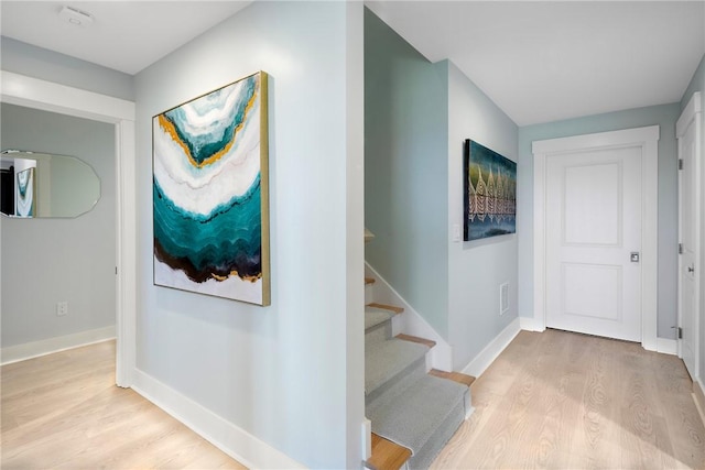 171 Leeshore Ln, Tiverton, RI 02878 - corridor with light wood-type flooring and stairway