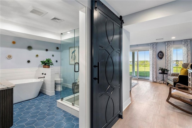171 Leeshore Ln, Tiverton, RI 02878 - bathroom featuring a stall shower, a soaking tub, and recessed lighting