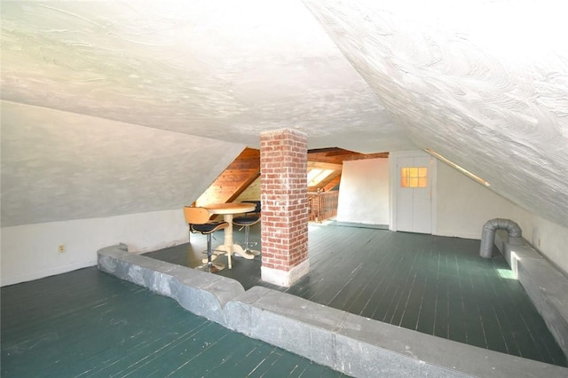 259 Green Hill Beach Rd, South Kingstown, RI 02879 - additional living space with lofted ceiling, baseboards, wood finished floors, and a textured ceiling