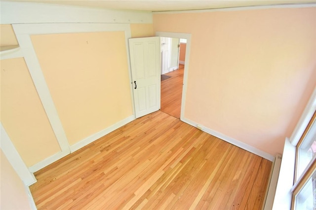 259 Green Hill Beach Rd, South Kingstown, RI 02879 - unfurnished bedroom with baseboards and light wood-style floors