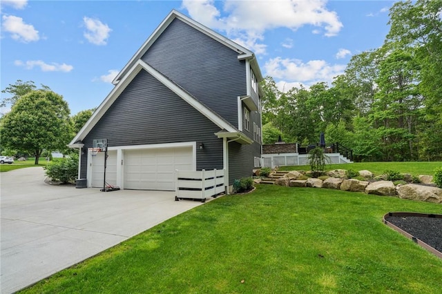 40 Oakbrook Ct, East Greenwich, RI 02818 - view of home's exterior featuring driveway and a lawn