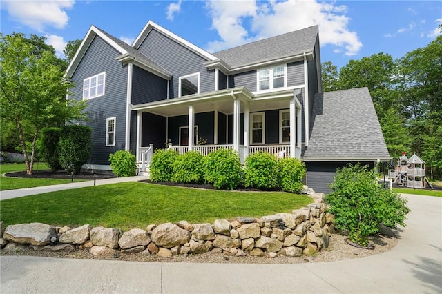 40 Oakbrook Ct, East Greenwich, RI 02818 - view of front facade with a porch, a front yard, and a shingled roof