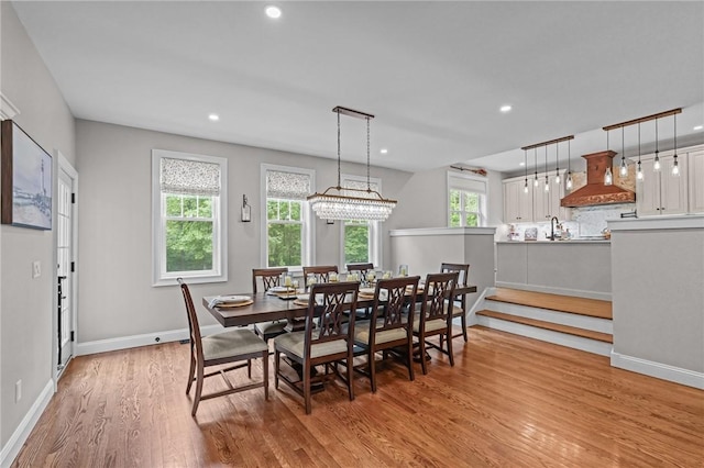 40 Oakbrook Ct, East Greenwich, RI 02818 - dining room featuring light wood-style flooring, plenty of natural light, recessed lighting, baseboards, and a chandelier