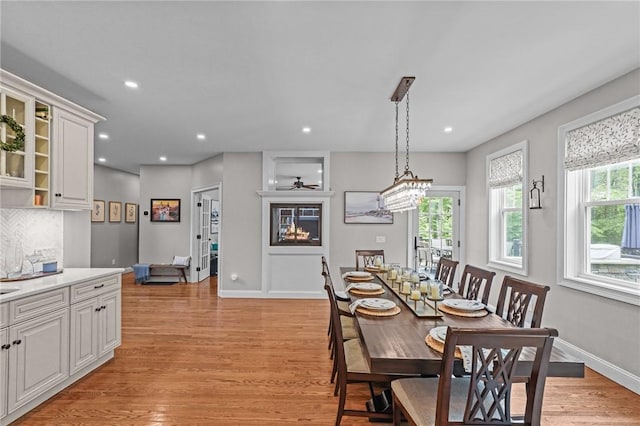40 Oakbrook Ct, East Greenwich, RI 02818 - dining room featuring light wood-type flooring, recessed lighting, baseboards, and a ceiling fan