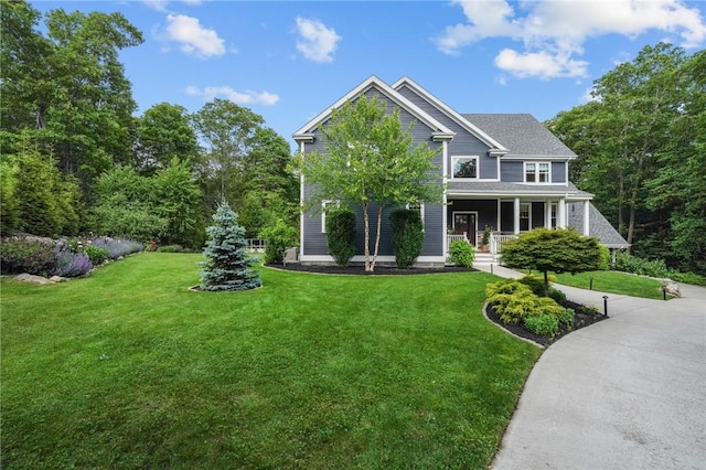 40 Oakbrook Ct, East Greenwich, RI 02818 - view of front of home with covered porch and a front yard
