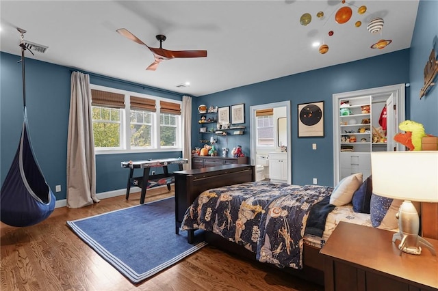 40 Oakbrook Ct, East Greenwich, RI 02818 - bedroom featuring wood finished floors, connected bathroom, baseboards, and ceiling fan