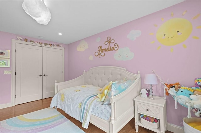 40 Oakbrook Ct, East Greenwich, RI 02818 - bedroom with wood finished floors and baseboards